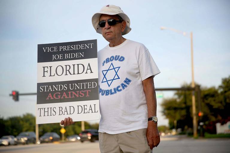 Alan Bergstein protests against the nuclear deal reached with Iran before U.S. Vice President Joe Biden meets with Jewish community leaders at the David Posnack Jewish Community Center to discuss the deal, Sept. 3, 2015
