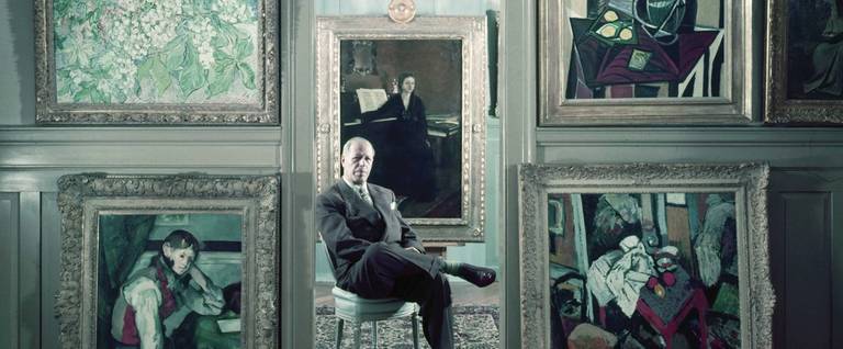 Emil Buhrle poses in his gallery, Zurich, Switzerland, 1954.