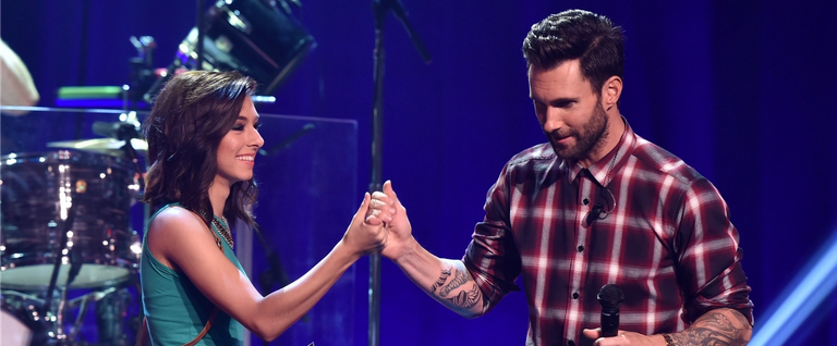 Christina Grimmie (L) and Adam Levine at iHeartRadio Theater in Burbank, California, August 26, 2014.