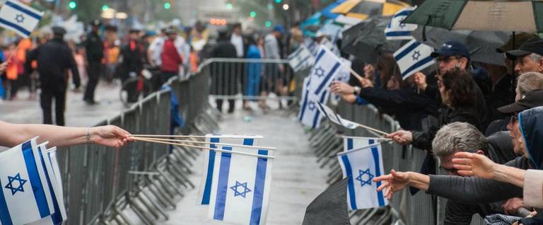 A scene from the Celebrate Israel Parade in the rain in New York City, June 5, 2016. 