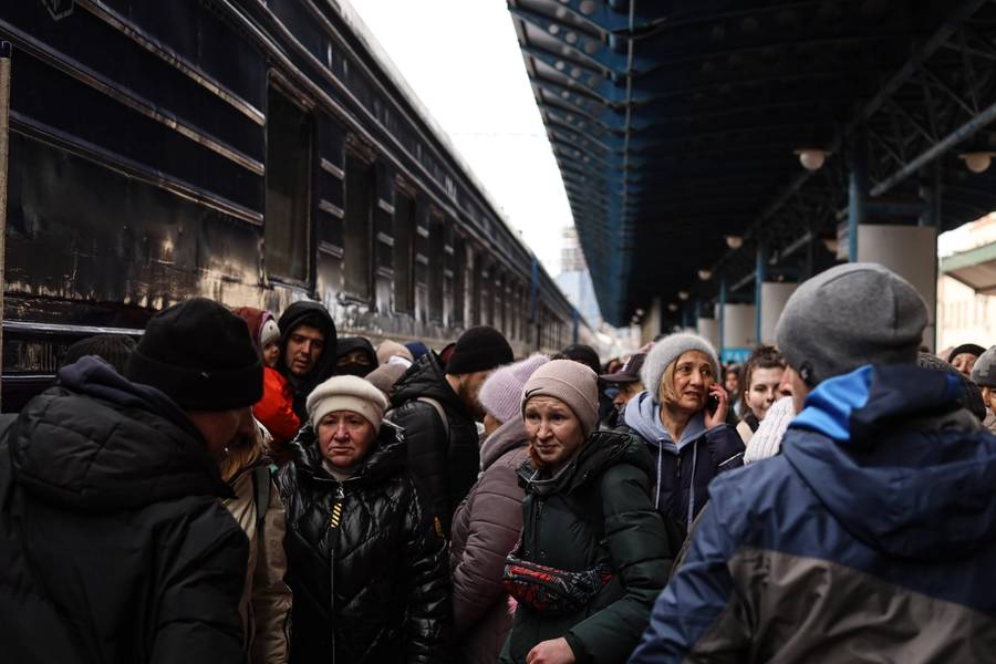March 5, 2022 - Kyiv, Ukraine. Hundreds of Ukrainians wait for a westbound train to open its doors before loading in and leaving the country.