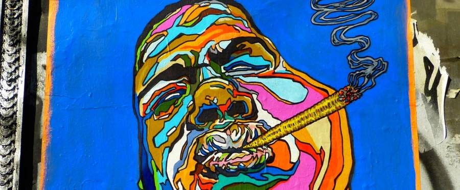 "iT WAS ALL A DREAM." graffiti caricature of rapper Notorious B.I.G. 