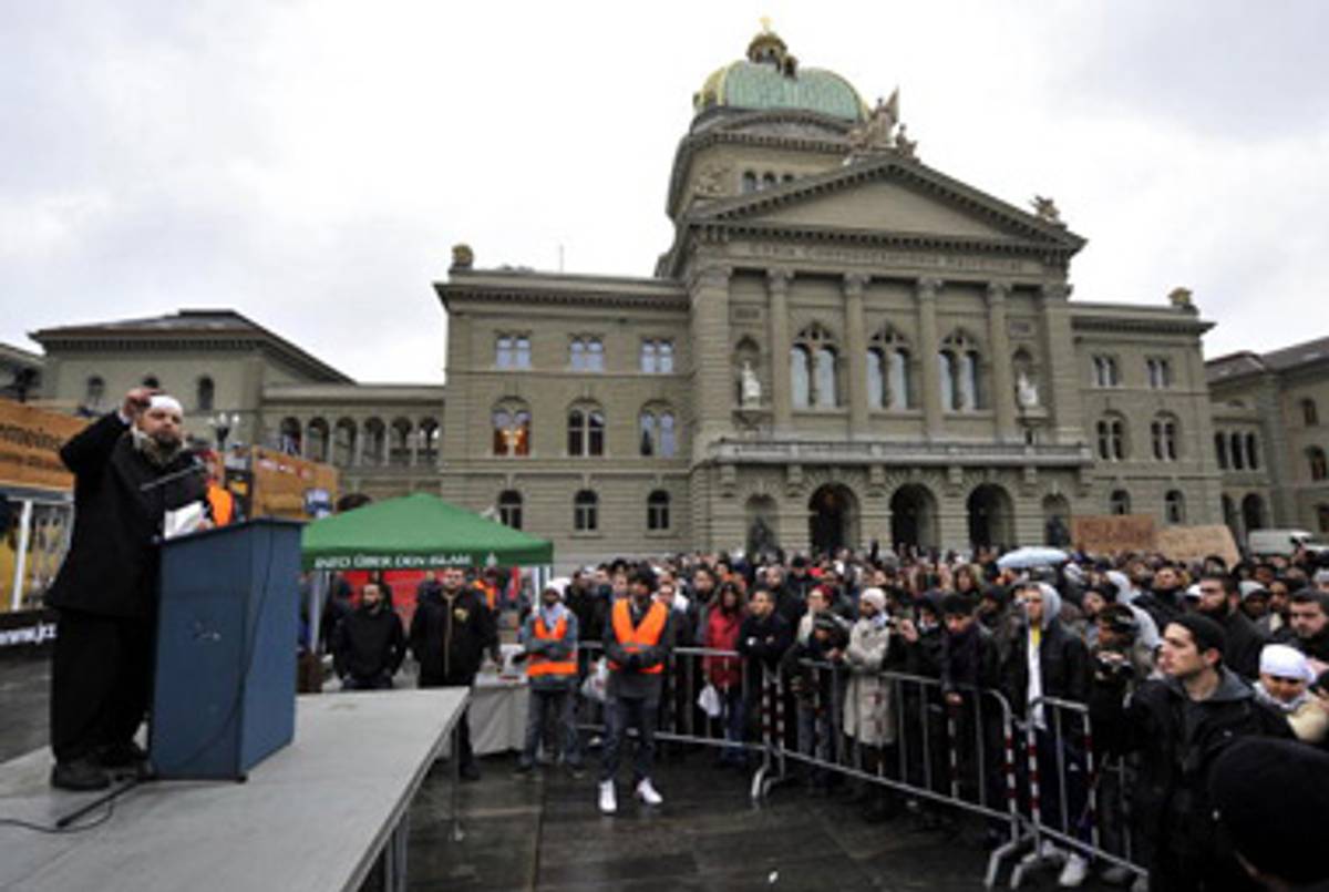 Muslims protest the Swiss ban in Bern earlier this month.(Fabrice Coffrini/AFP/Getty Images)