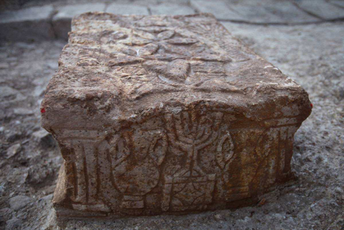 A large elaborately-carved stone found during 2009 excavations of a newly uncovered Jewish synagogue in the town of Migdal on the north-western end of the Sea of Galilee. (David Silverman/Getty Images)