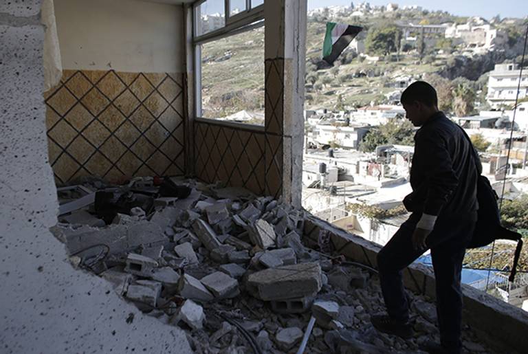 The family home of Abdelrahman Shaludi, a Palestinian who killed two Israelis with his car last month, which was razed by Israeli authorities in East Jerusalem on Nov. 19, 2014. (AHMAD GHARABLI/AFP/Getty Images)