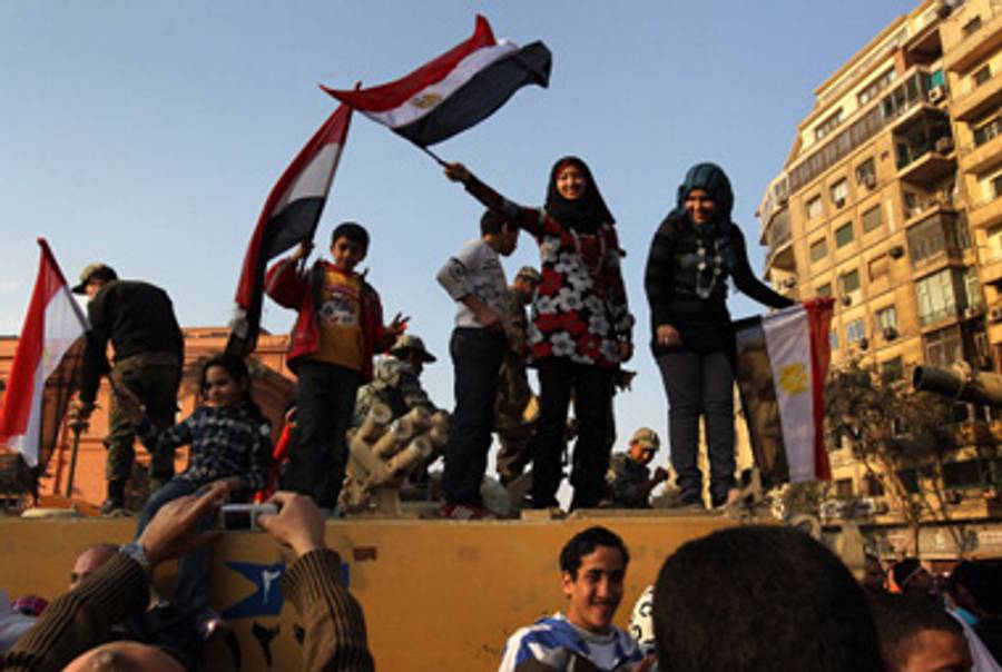 Egyptians celebrating in Tahrir Square last month after Hosni Mubarak stepped down.(John Moore/Getty Images)