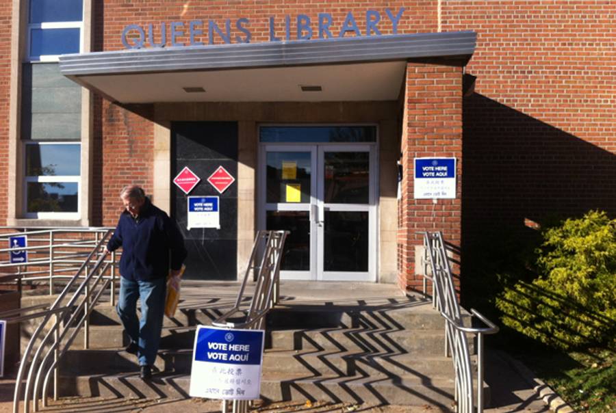A voter leaves the Queens library on Nov. 6, 2012. (Photo by the author.)