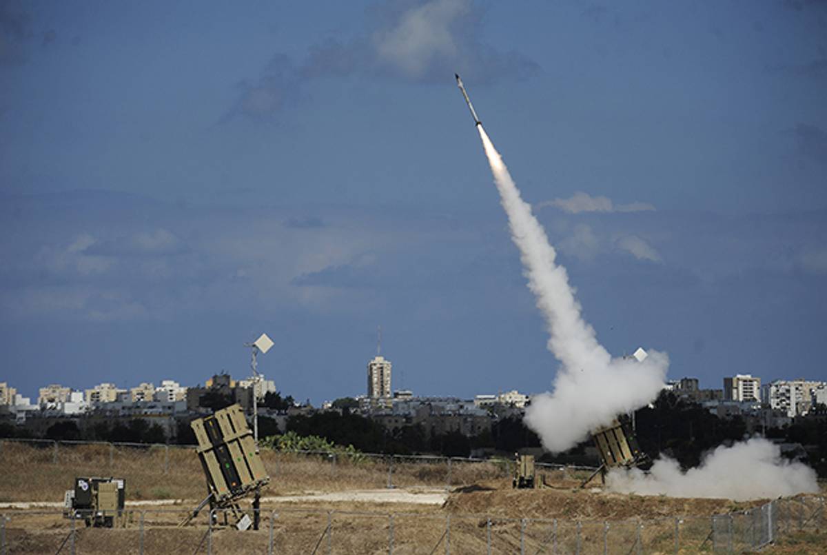 A missile is launched by an 'Iron Dome' battery, a missile defence system designed to intercept and destroy incoming short-range rockets and artillery shells, in the southern Israeli city of Ashdod on July 18, 2014. (DAVID BUIMOVITCH/AFP/Getty Images)