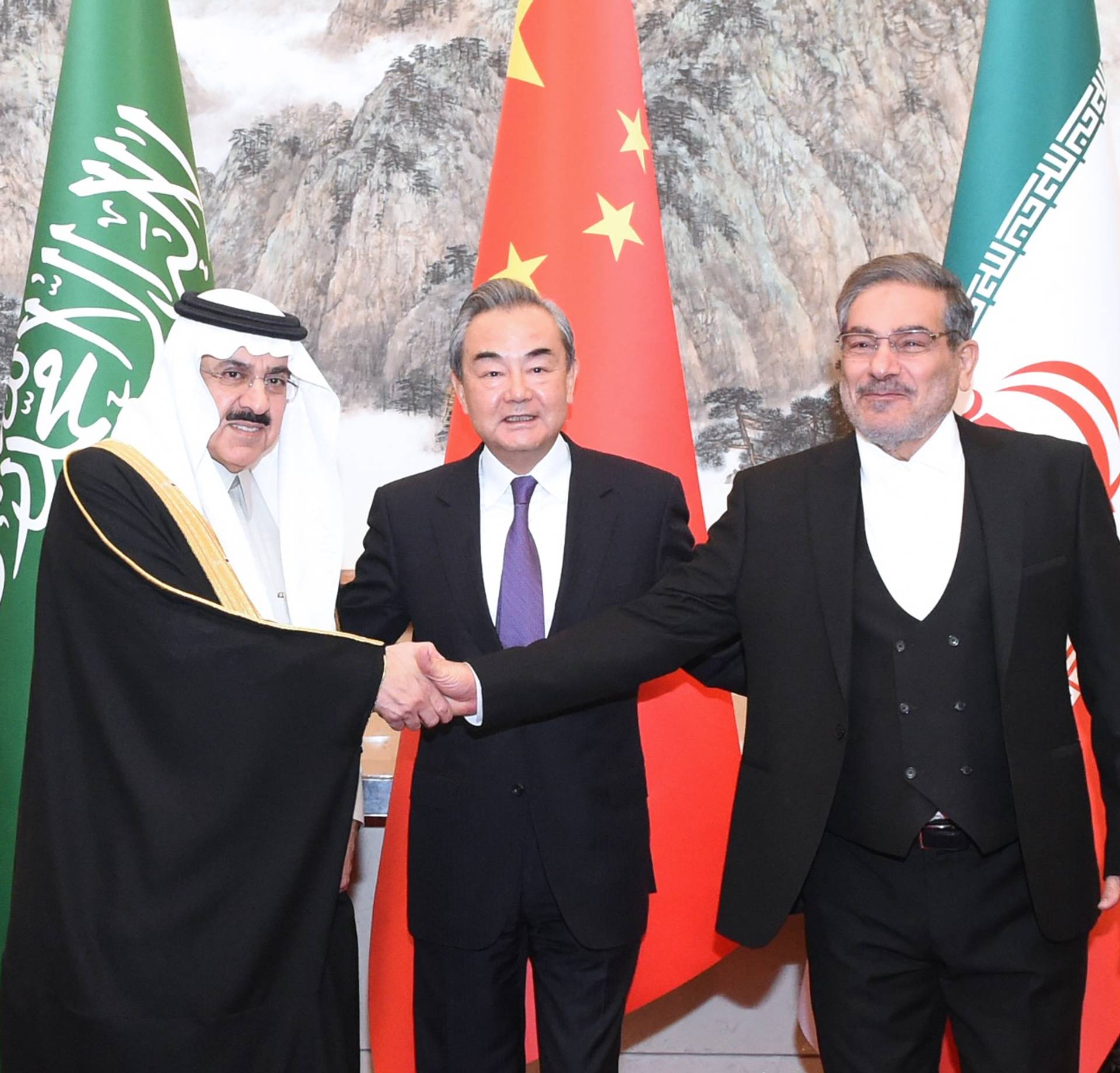 From left: Saudi Minister of State Musaad bin Mohammed Al-Aiban, CCP Politburo member Wang Yi, and Iranian Secretary of the Supreme National Security Council Ali Shamkhani in Beijing, March 10, 2023