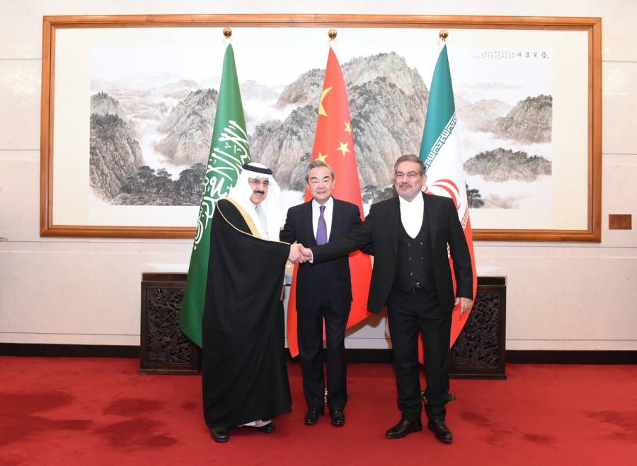 From left: Saudi Minister of State Musaad bin Mohammed Al-Aiban, CCP Politburo member Wang Yi, and Iranian Secretary of the Supreme National Security Council Ali Shamkhani in Beijing, March 10, 2023