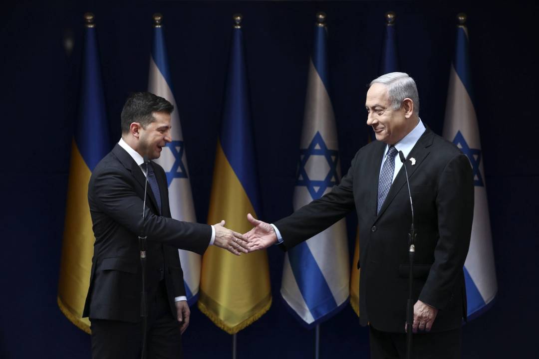 Israeli Prime Minister Benjamin Netanyahu and Ukrainian President Volodymyr Zelensky shake hands during their meeting in Jerusalem on Jan. 24, 2020