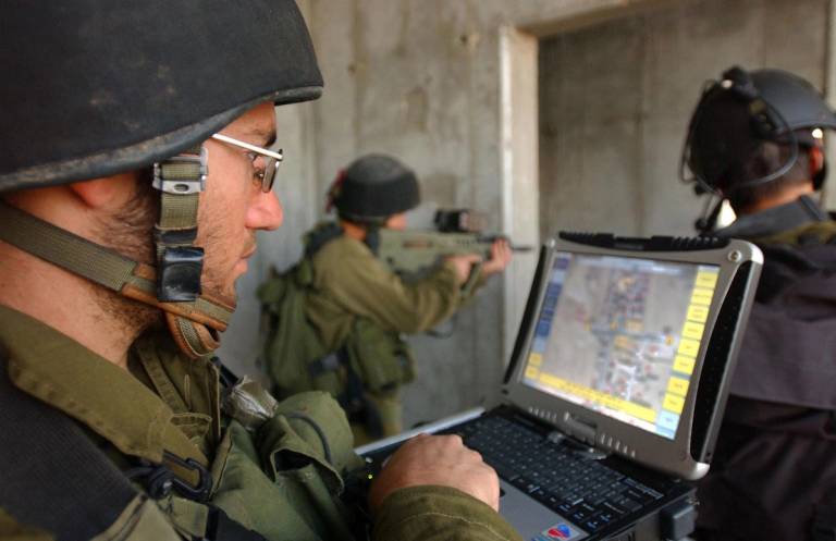 Infantry soldiers from the Givati Brigade are put through their paces with new, high-tech weapons and computers at the army's urban warfare training base, in this IDF photo from 2005