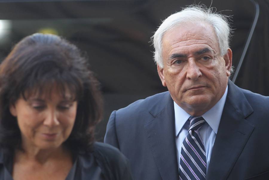 Former International Monetary Fund (IMF) director Dominique Strauss-Kahn enters Manhattan State Supreme Court with his wife Anne Sinclair on August 23, 2011 in New York City. (Mario Tama/Getty Images)