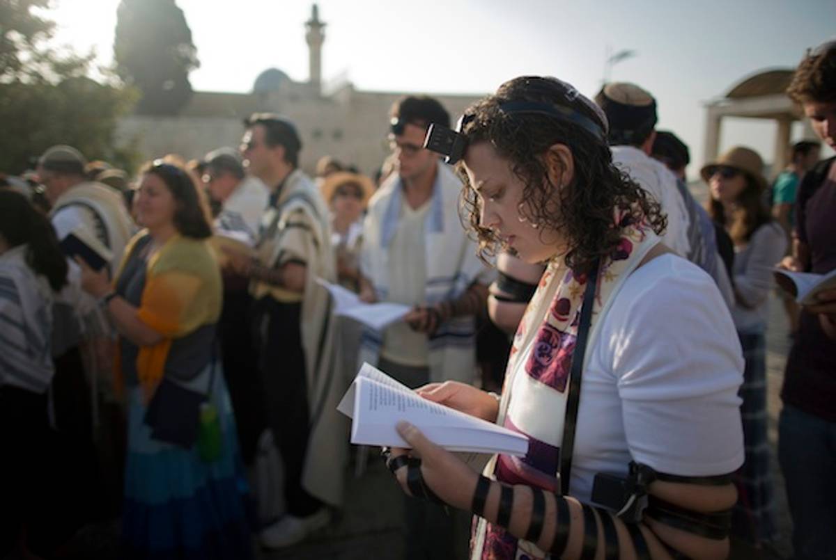 Members of Women of the Wall pray at the plaza near the Western Wall on July 8, 2013 marking the first day of the Jewish month of Av(MENAHEM KAHANA/AFP/Getty Images)