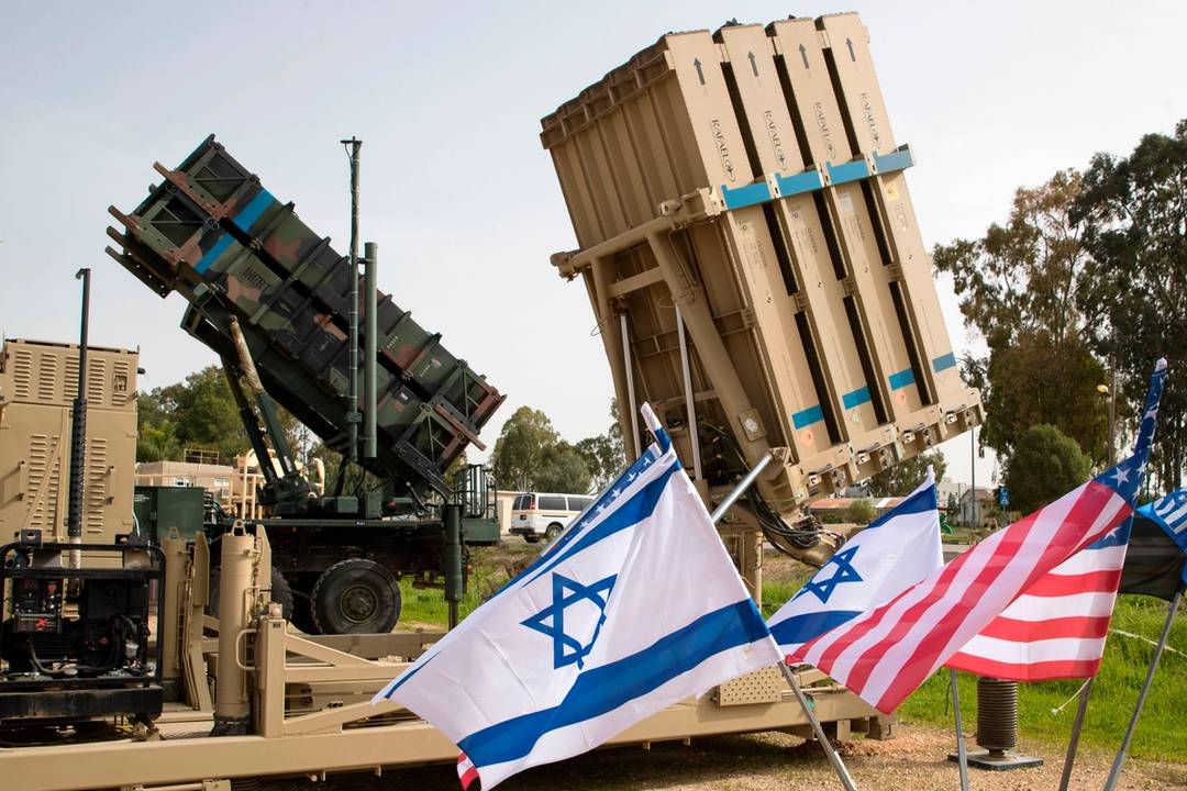 An Iron Dome anti-rocket system, at right, and a U.S. Patriot missile defense system, left, during a joint Israel-U.S. military exercise in 2018