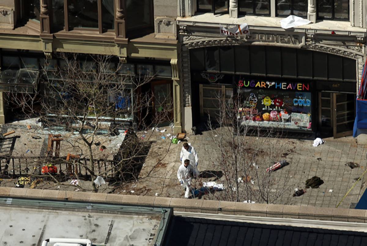 BOSTON, MA - APRIL 17: Investigators stand at the scene of twin bombings at the Boston Marathon on April 17, 2013 in Boston, Massachusetts. ((Spencer Platt/Getty Images))