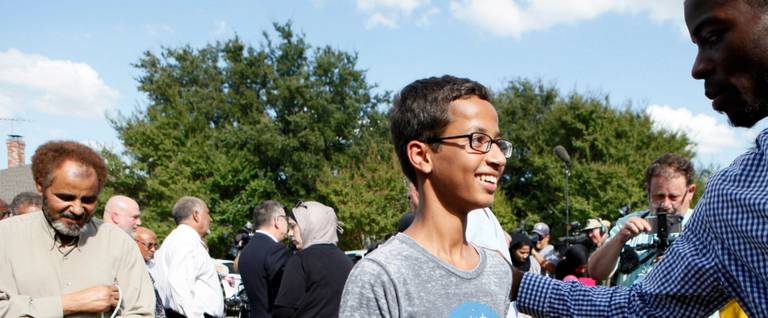14-year-old Ahmed Mohamed is greeted by a supporter during a news conference  in Irving, Texas, September 16, 2015. 