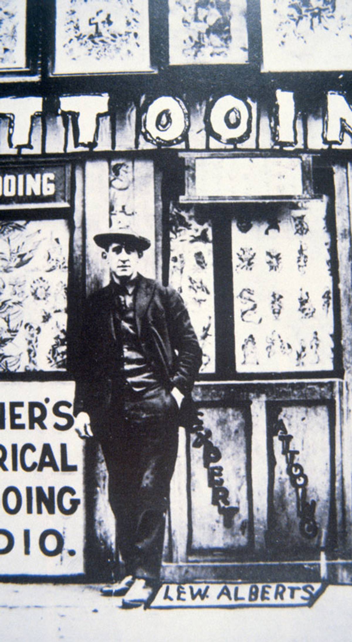 ‘Lew the Jew’ Alberts in front of one of Charlie Wagner’s Bowery tattoo parlors, photographer unknown, circa 1917. (Photo courtesy Tattoo Archive)