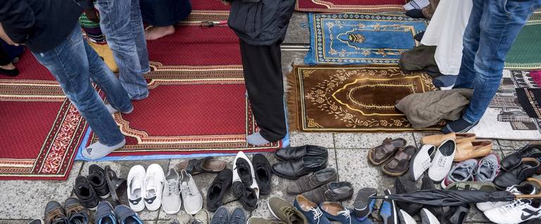 Shoes left alongside worshippers at the Essalam Mosque in Rottderdam.