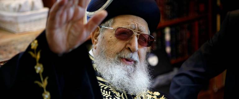 Rabbi Ovadia Yossef, spiritual leader of the Israeli Orthodox Shas party, gestures during a meeting in Jerusalem on December 11, 2011.