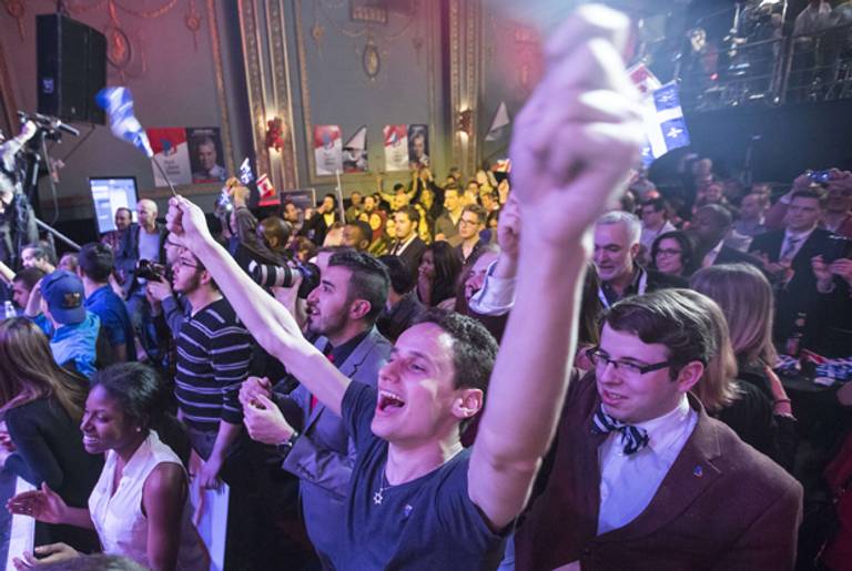 Parti Liberal Québécois supporters celebrate their party victory at the plaza theatre in Montreal April 6, 2014. (François Laplante-Delagrave/AFP/Getty Images)