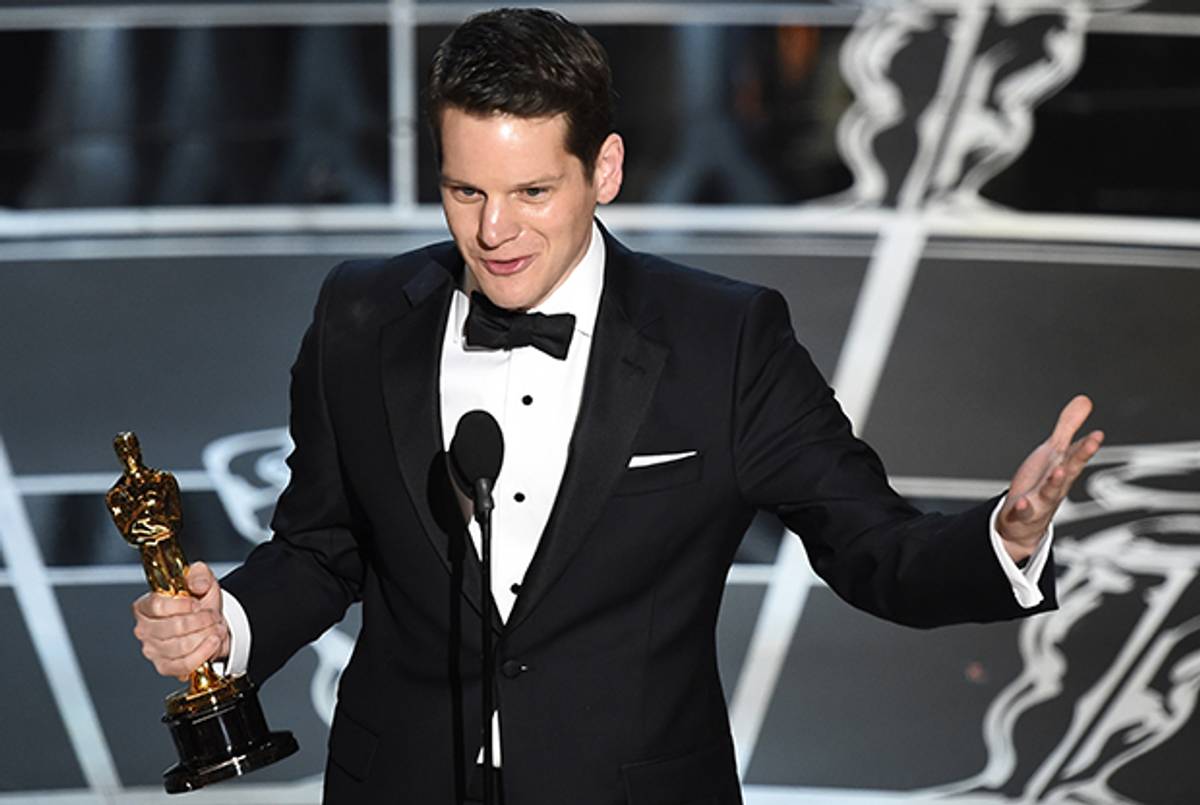 Winner for Best Adapted Screenplay 'The Imitation Game' Graham Moore accepts his award on stage at the 87th Oscars on February 22, 2015 in Hollywood, CA. (ROBYN BECK/AFP/Getty Images)
