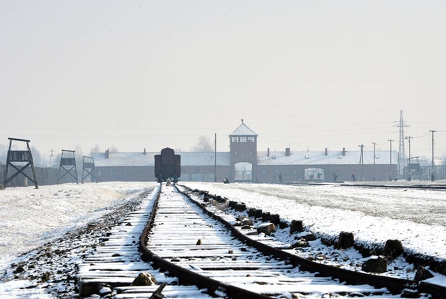 View of the rail way tracks at the former Nazi concentration camp Auschwitz-Birkenau in Oswiecim, Poland, on Holocaust Day, January 27, 2014. (JANEK SKARZYNSKI/AFP/Getty Images)
