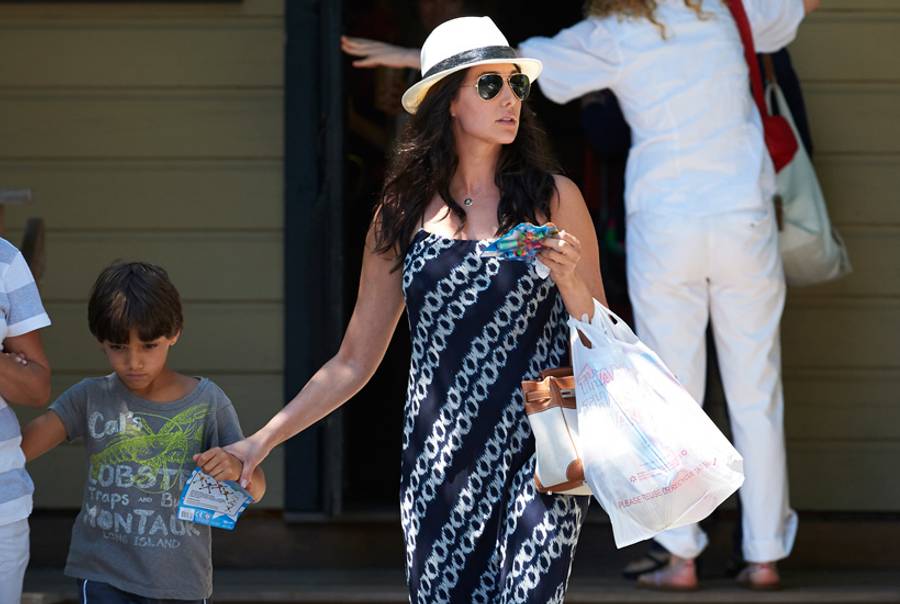 Lauren Silverman, wife of real estate mogul Andrew Silverman, leaves the Sagg Store with her son, Adam, on Friday, August 2, 2013, in Sagaponack, N.Y. (James Keivom/NY Daily News via Getty Images)