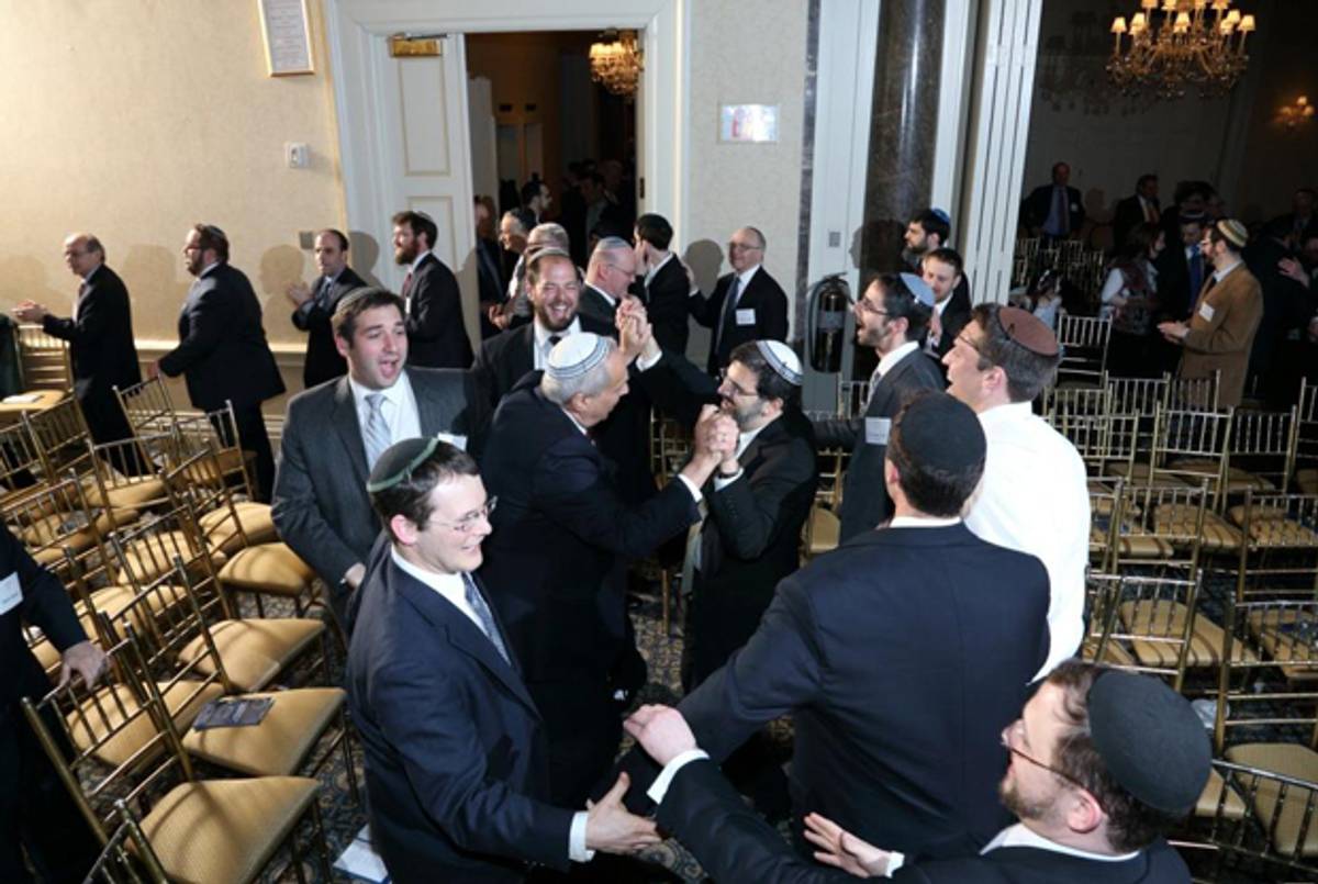 Rabbi Asher Lopatin, center, at Yeshivat Chovevei Torah’s Tenth Annual Tribute Dinner on March 10, 2013, at the Harmonie Club in New York City.(Three Star Photography)