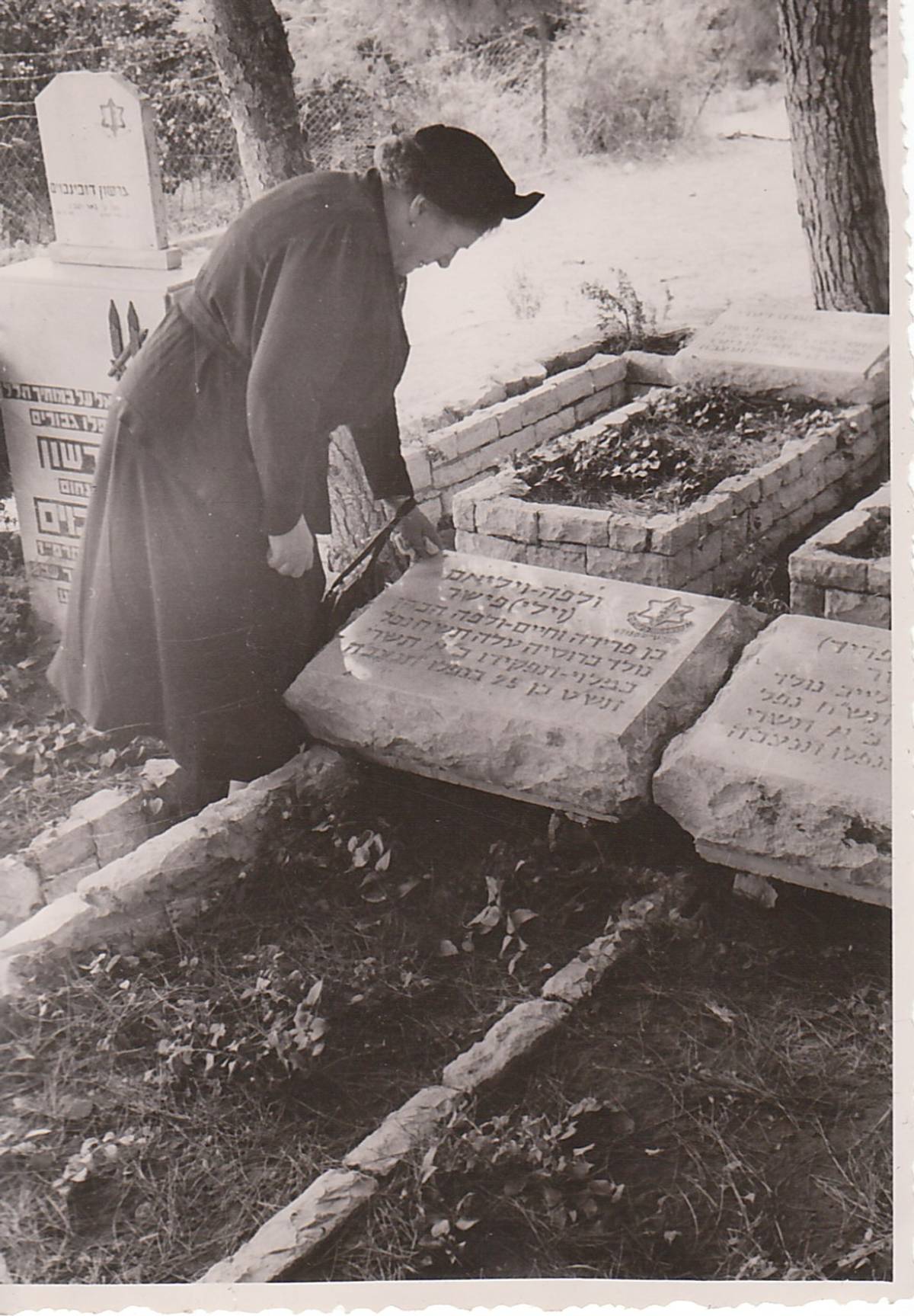 Willy Fisher’s mother visits his grave, 1950
