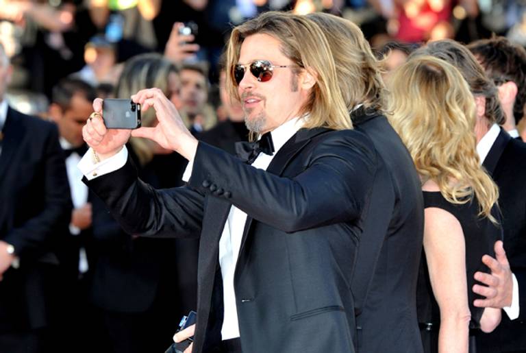 Actor Brad Pitt attends the 'Killing Them Softly' Premiere during 65th Annual Cannes Film Festivalon May 22, 2012. (Photo by Gareth Cattermole/Getty Images)