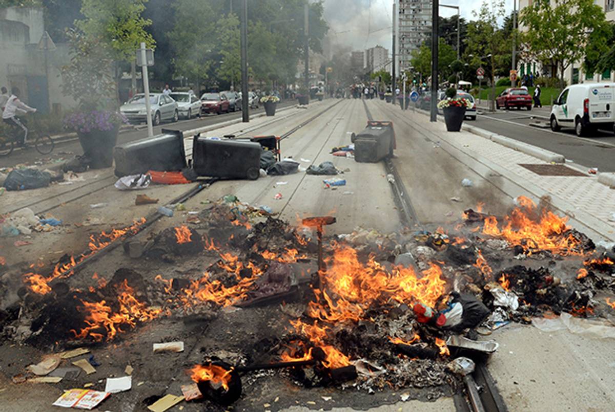 Burning detritus are seen along the tramway line in Sarcelles, a suburb north of Paris, on July 20, 2014, after clashes following a demonstration denouncing Israel's military campaign in Gaza and showing support to the Palestinian people. (PIERRE ANDRIEU/AFP/Getty Images)