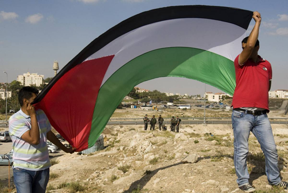 Protesters in the West Bank express solidarity with the hunger-strikers Saturday.(Ahmad Gharabli/AFP/GettyImages)