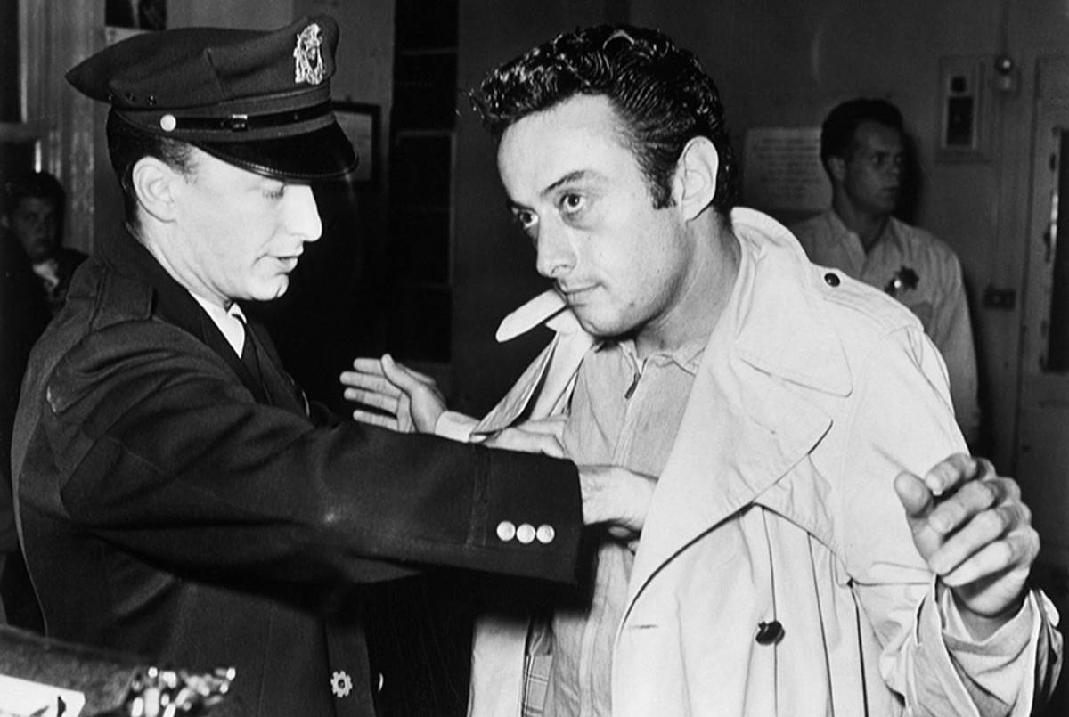 A policeman searches comedian Lenny Bruce after Bruce's arrest for allegedly using obscene language during his act in a North Beach nightclub, the Jazz Workshop in San Francisco, California, 1961.(Bettmann/Corbis /AP)