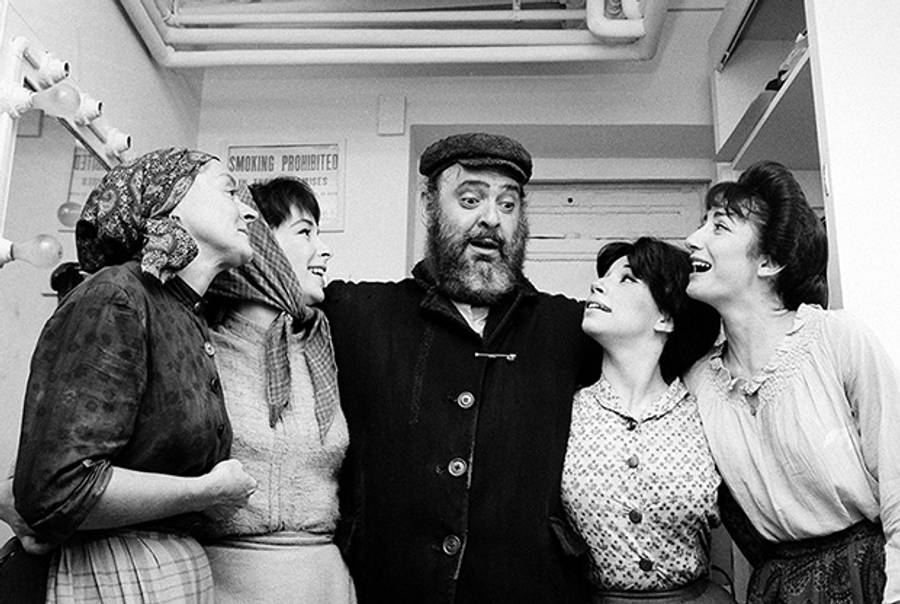 Fiddler on the Roof cast on the show's first-ever opening night, Sept. 22, 1964, featuring Zero Mostel, Maria Karnilova, Tanya Everett, Julia Migenes, and Joanna Merlin. (AP)