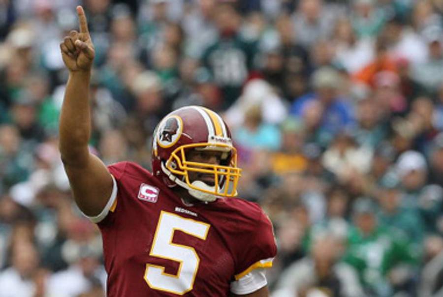 McNabb after throwing his touchdown pass yesterday to tight end Chris Cooley.(Jim McIsaac/Getty Images)