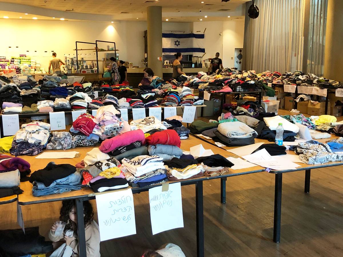 Tables of donated items in the hotel ballroom 