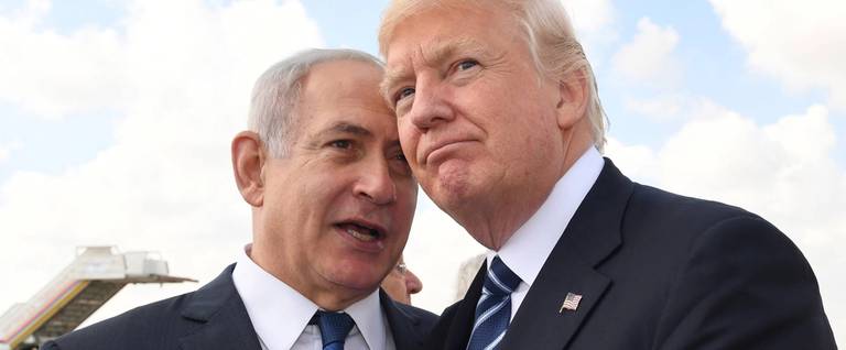 Israeli Prime Minister Benjamin Netanyahu speaks with U.S. President Donald Trump prior to the president's departure from Ben-Gurion International Airport in Tel Aviv, 2017 
