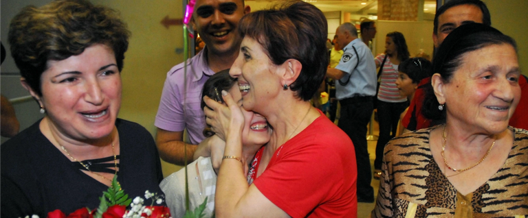 Israelis welcome their Georgian Jewish relatives upon arrival at Ben-Gurion Airport on Aug. 12, 2008, after being evacuated from Georgia with the help of the Israeli Foreign Ministry and the Jewish Agency. 