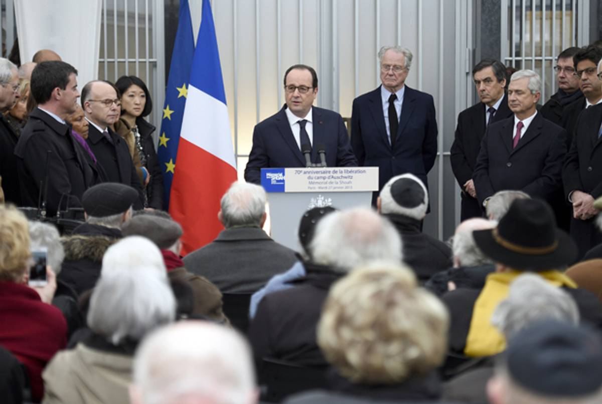 French President Francois Hollande gives a speech at the Holocaust memorial in Paris on January 27, 2015 to mark the international day of Holocaust remembrance, and the 70th anniversary of the liberation of the Auschwitz-Birkenau concentration camp. (MARTIN BUREAU/AFP/Getty Images)