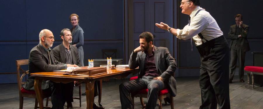 Anthony Azizi, Dariush Kashani, Michael Aronov, Joseph Siravo (foreground), Jennifer Ehle, and Jefferson Mays (background) in a scene from Lincoln Center Theater's critically acclaimed production of OSLO by J.T. Rogers, directed by Bartlett Sher, which will reopen on Broadway at the Vivian Beaumont Theater this Spring.