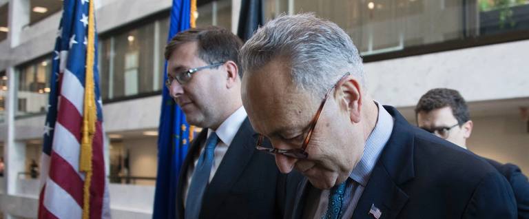Senator Chuck Schumer (C), D-New York, arrives at his office on Capitol Hill prior to a meeting with Vice President-elect Mike Pence, Washington, D.C., November 17, 2016. 