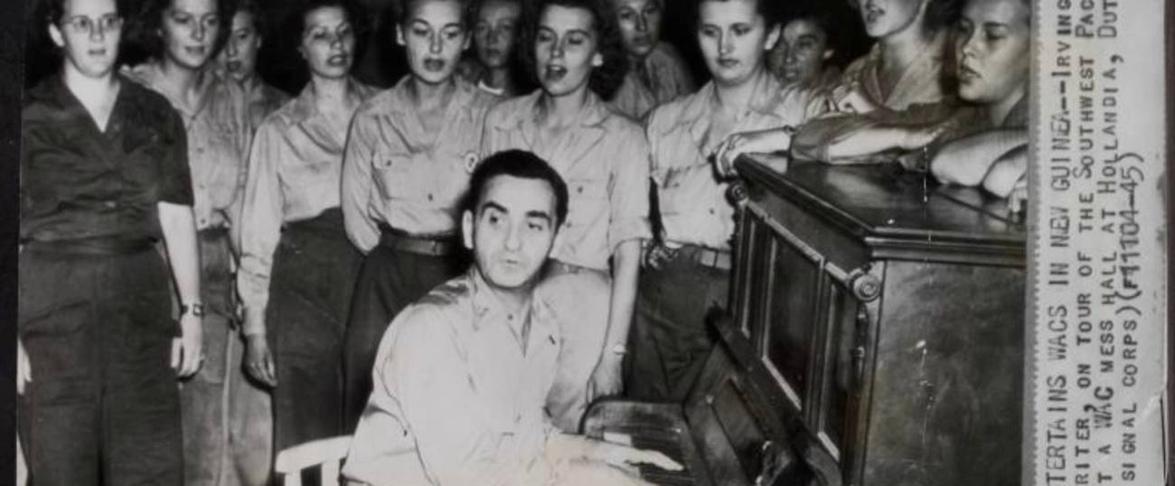 Irving Berlin entertains Women's Army Corps in New Guinea, December 28, 1944. 