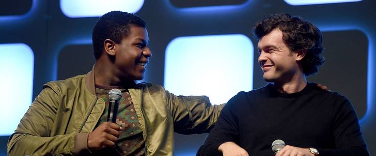 John Boyega (L) and Alden Ehrenreich, who will play Han Solo, on stage during Future Directors Panel at the Star Wars Celebration 2016 in London, England, July 17, 2016. 