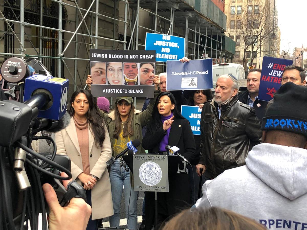 Vernikov, center, and Dov Hikind, at her right, at a rally outside the Brooklyn Central Court building demanding justice for a Jewish man who was assaulted in a December 2021 hate crime, on Jan. 18, 2023
