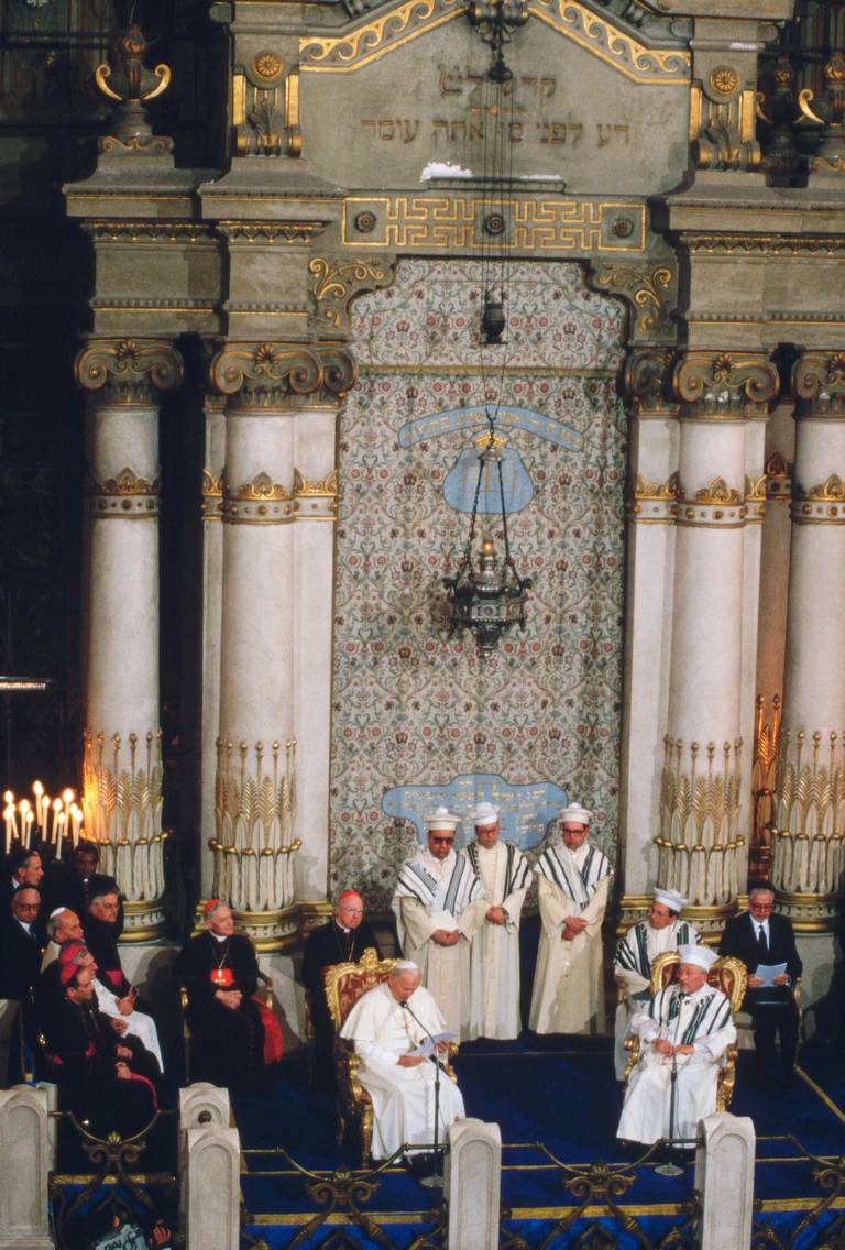 Pope John Paul II seated with Elio Toaff, the chief rabbi of Italy, in the Great Synagogue of Rome, April 13, 1986