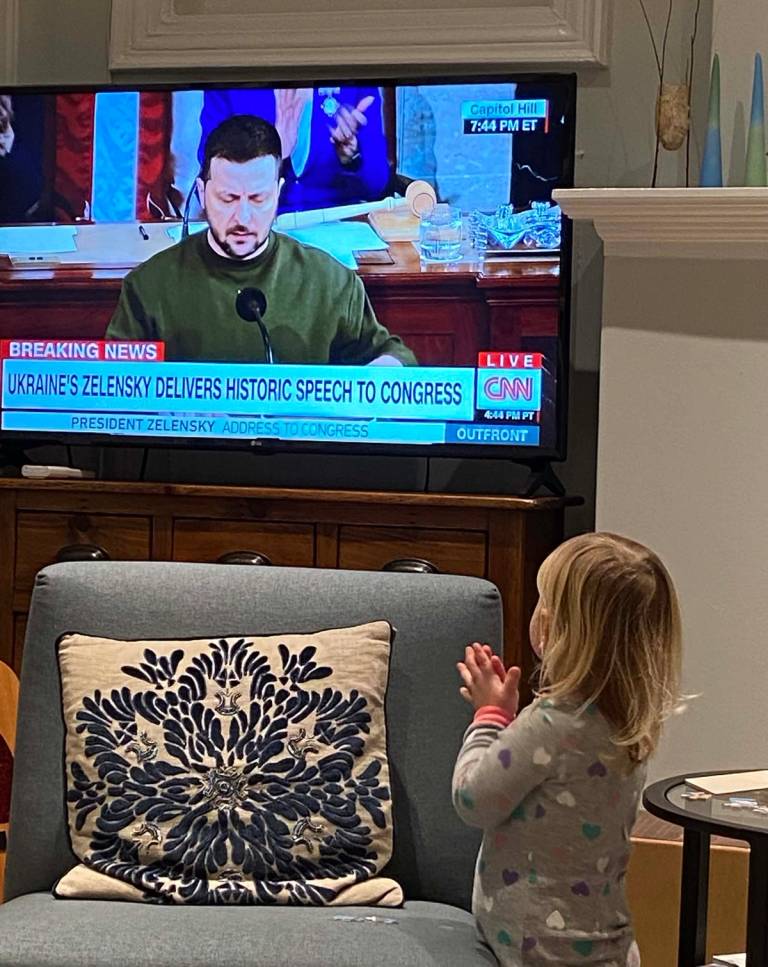 ‘Anna’ clapping along with Congress as Zelensky addresses them earlier this year while watching on the TV in the author's living room