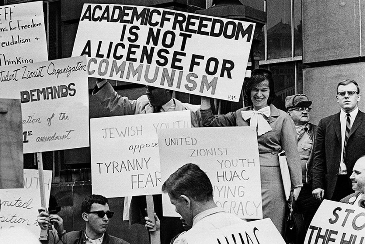 Pickets supporting and opposing a House subcommittee on un-American activities hearing into possible communist subversion in the Buffalo area in front of the U.S. Court House in Buffalo, New York, on April 30, 1964. (Lennox McLendon/AP)