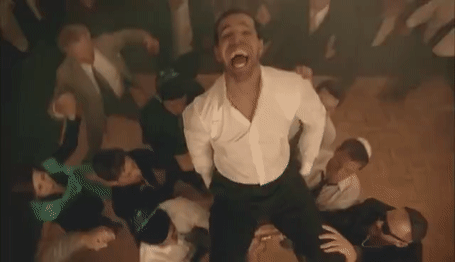 Drake is lifted in a still from the bar mitzvah-themed music video for his song 'HYFR,' 2012