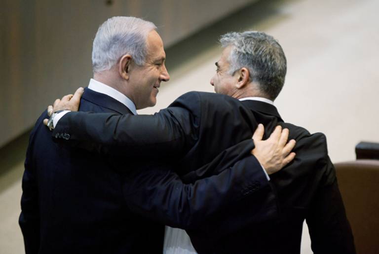 Israeli Prime Minister Benjamin Netanyahu and Finance Minister Yair Lapid on March 18, 2013 in Jerusalem, Israel. (Uriel Sinai/Getty Images)